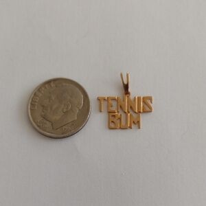 90's Goldbond 'Tennis Bum' Pendant